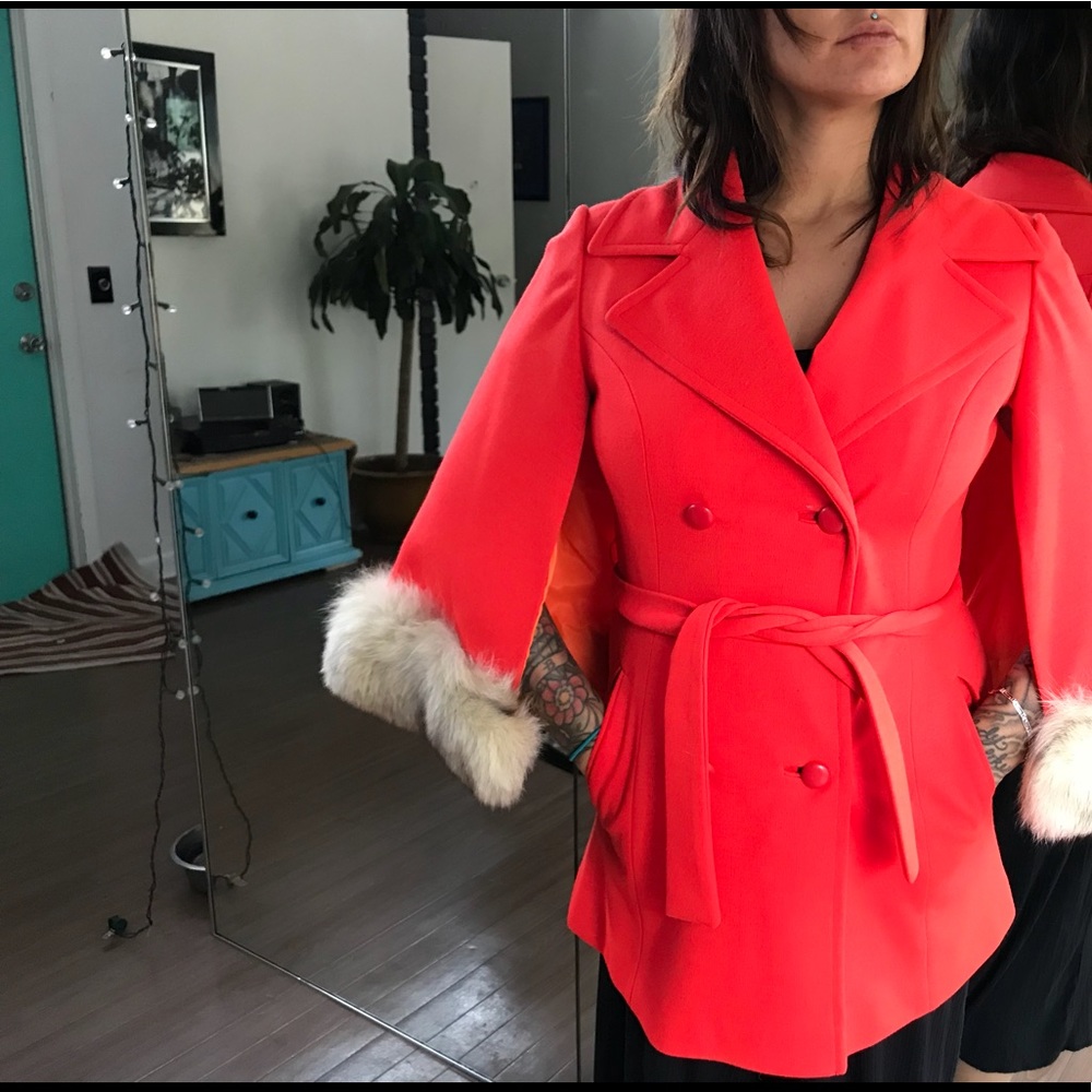 Vintage red/ orange cape with real fur cuffs .